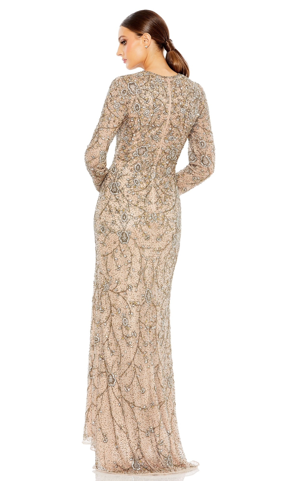 A woman stands with her back to the camera in the Long Formal Dress 5308 by Mac Duggal, a floor-length beige gown with long sleeves, detailed beadwork, and elegant embroidery.